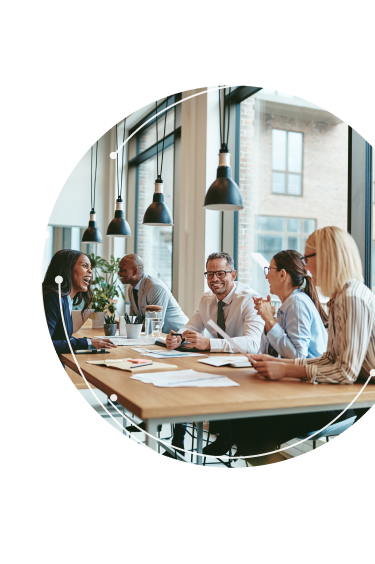 Team working at a table together in office